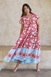 Model Tahneei wearing size 10 of the Kurrawa Beach Cotton Dress – Redblue in colour Redblue, from the front