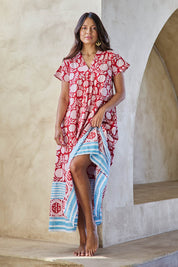 Model Tahneei wearing size 10 of the Kurrawa Beach Cotton Dress – Redblue in colour Redblue, from the front
