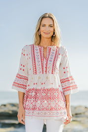 Model Riina wearing size 10 of the Avalon Beach Blouse in colour Pinkred (Pink), from the front, showing the whole outfit