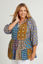 Model Fiona wearing size 16 of the Brighton Beach Top in colour Patchblue (Blue), from the front, cropped image