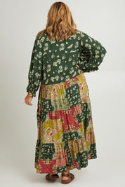 Model Fiona wearing size 16 of the Middleton Beach Maxi Dress in colour Patcholive (Green), from the back