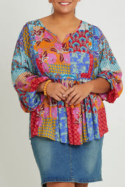 Model Ashleigh wearing size 16 of the Burleigh Beach Top in colour Patchmulti, from the front, cropped image