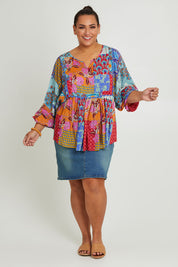 Model Ashleigh wearing size 16 of the Burleigh Beach Top in colour Patchmulti, from the front, showing the whole outfit