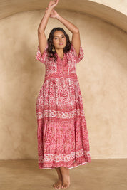 Model Tahnee wearing size 10 of the Cottesloe Beach Cotton Maxi Dress in colour Pinkfloral (Pink), from the front, showing the whole outfit