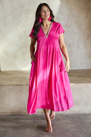 Model Tahneei wearing size 10 of the San Rafael Falls Kimono Dress – Pink in colour Pink, from the front
