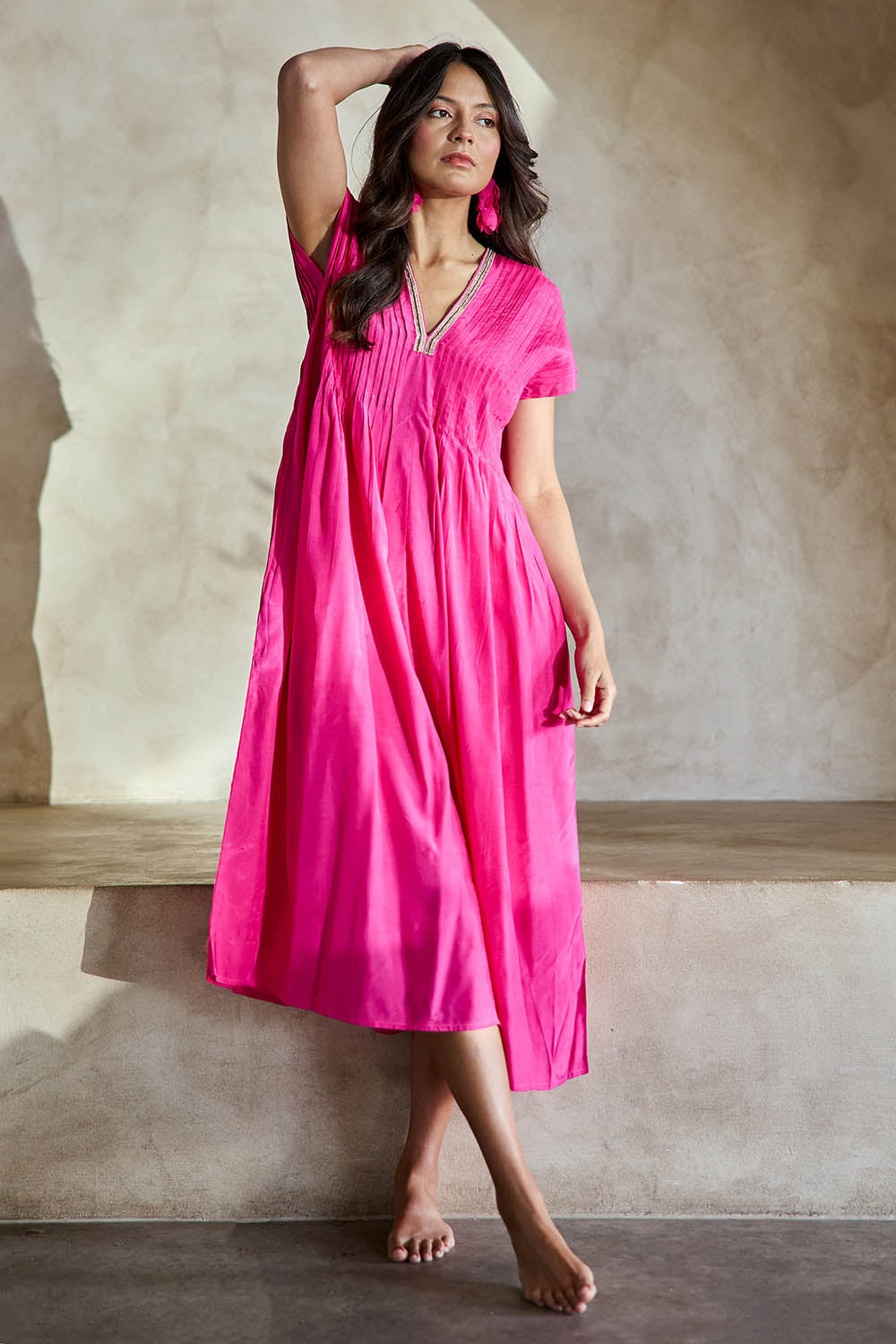 Model Tahneei wearing size 10 of the San Rafael Falls Kimono Dress – Pink in colour Pink, from the front