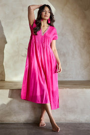 Model Tahneei wearing size 10 of the San Rafael Falls Kimono Dress – Pink in colour Pink, from the front