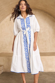 Model Tahnee wearing size 10 of the Ipanema Beach Cotton Embroidered Dress in colour Whiteblue (Blue), from the front, showing the whole outfit