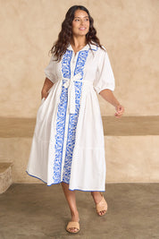 Model Tahnee wearing size 10 of the Ipanema Beach Cotton Embroidered Dress in colour Whiteblue (Blue), from the front, showing the whole outfit