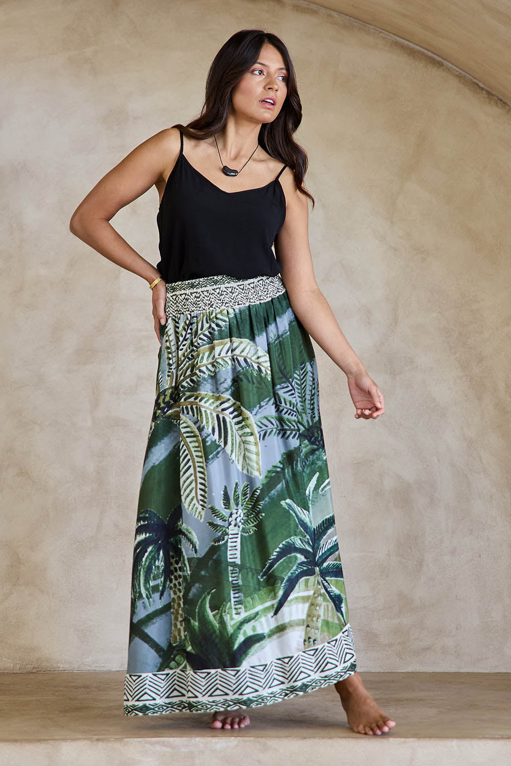 Model Tahneei wearing size 10 of the Palm Cove Long Skirt – Tropical in colour Tropical, from the front