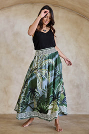 Model Tahneei wearing size 10 of the Palm Cove Long Skirt – Tropical in colour Tropical, from the front