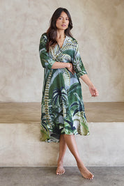 Model Tahneei wearing size 10 of the Sapphire Beach Shirt Dress – Tropical in colour Tropical, from the front