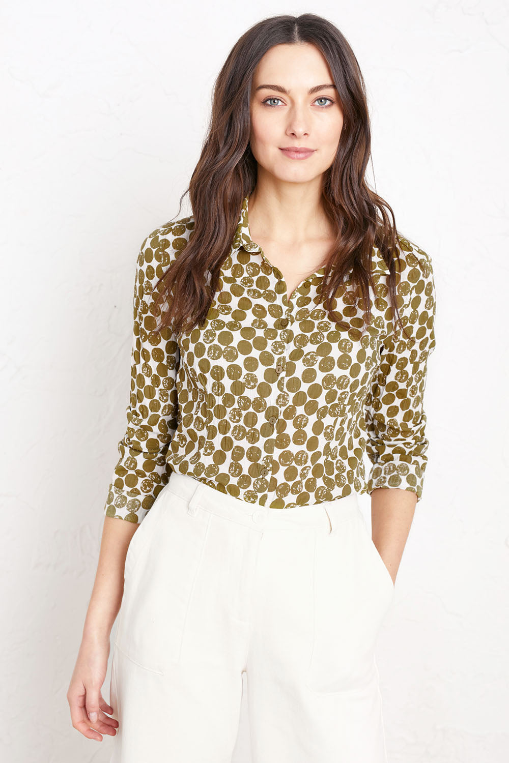 A model wearing the Larissa Shirt in colour Spotcutstm (White), from the front, cropped image