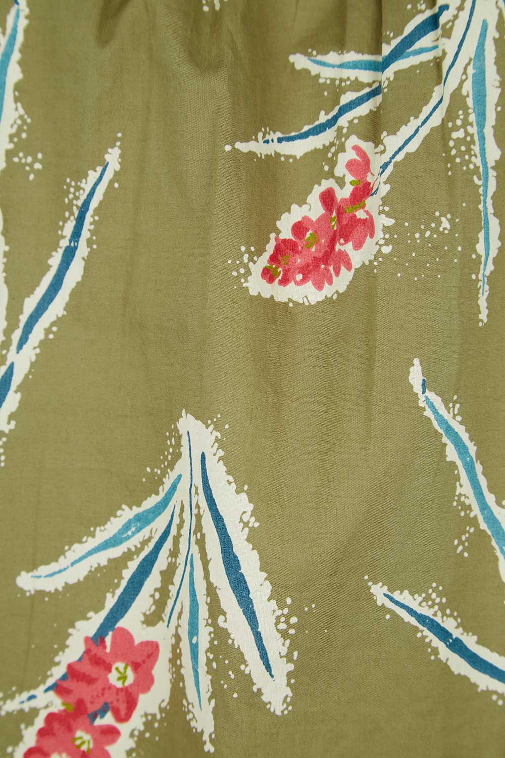 Product shot of the Garden Gate Top in colour Lxiaflower (Green), detail
