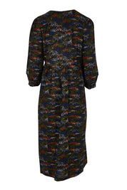 Product shot of the Sea Line Dress in colour Moormeadow (Black), from the back