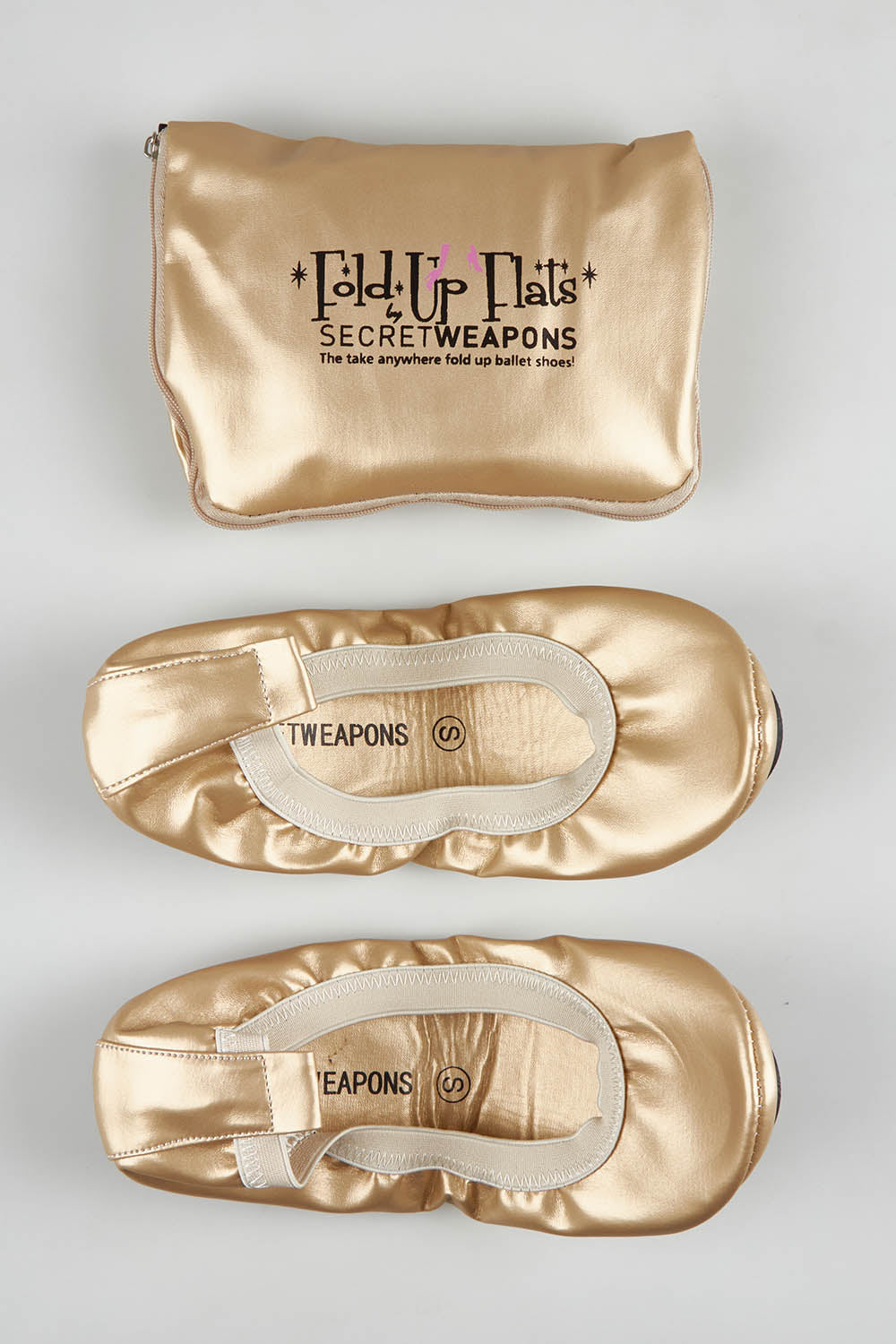 A model wearing size S of the Fold Up Flats in colour Golden (Metallics), from the front, showing the whole outfit