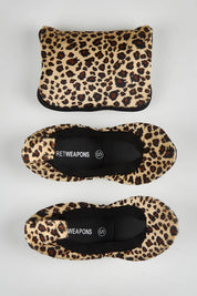 A model wearing size S of the Fold Up Flats in colour Leopard (Black), from the front, showing the whole outfit