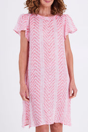 Model Emma wearing size 10 of the Flutter Sleeve Dress in colour Redwhite (Red), from the front, cropped image