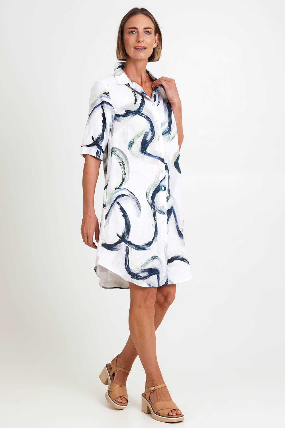 Model Riinar wearing size 10 of the Riverstone Shirtmaker Dress – Riverstone in colour Riverstone, from the front