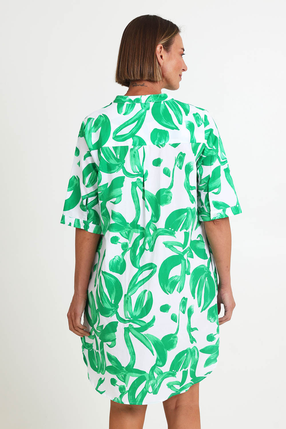 Model Riinar wearing size 10 of the Garden Shirtmaker Dress – Emerald in colour Emerald, from the back