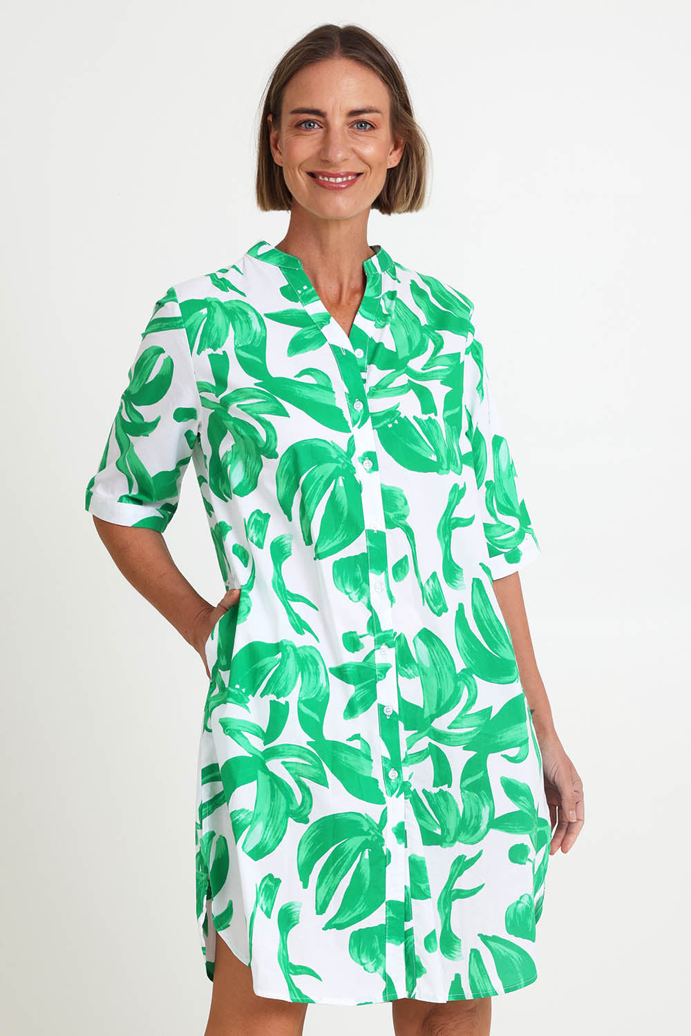 Model Riinar wearing size 10 of the Garden Shirtmaker Dress – Emerald in colour Emerald, in a cropped view