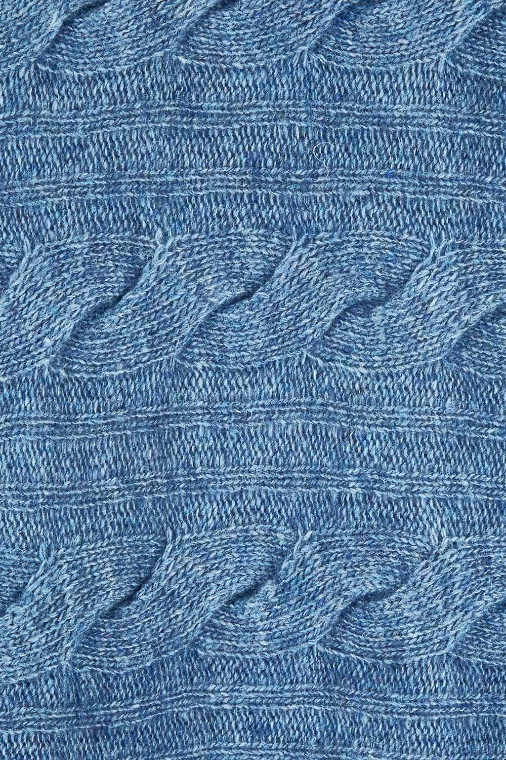 Product shot of the Lambswool Blend Cable Poncho in colour Denim (Blue), detail