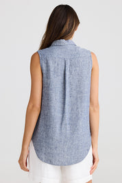 A model wearing the Bazzar Linen Top in colour Navyflick (Blue), from the back