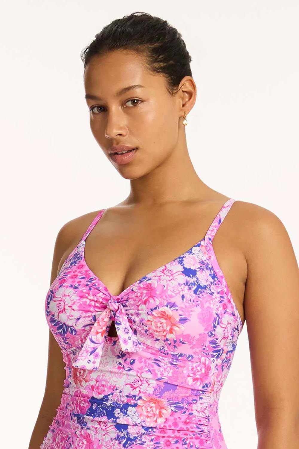 A model wearing the Tie Front Dd/E One Piece in colour Pink (Pink), from the front, cropped image