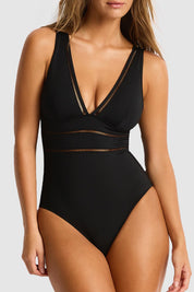 A model wearing the Spliced One Piece in colour Black (Black), from the front, cropped image