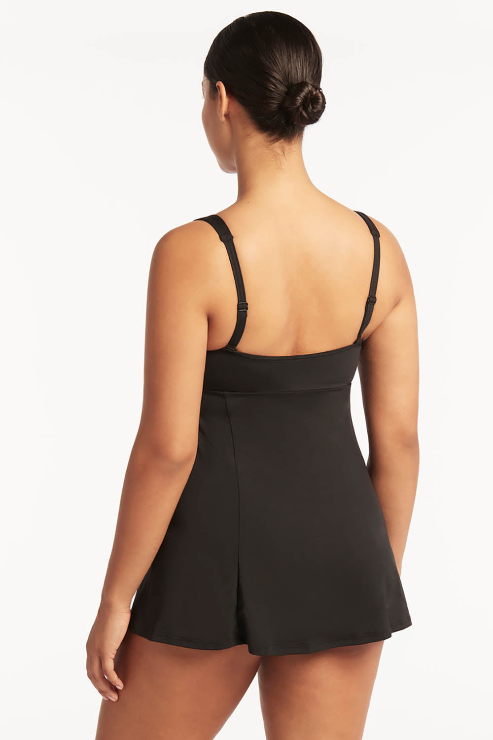 A model wearing the Square Neck Tummy Control Swim Dress in colour Black (Black), from the back