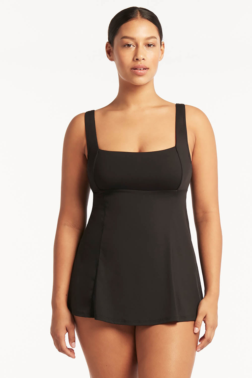 A model wearing the Square Neck Tummy Control Swim Dress in colour Black (Black), from the front, cropped image