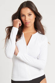 A model wearing the Long Sleeved Rash Vest in colour White (White), from the front, cropped image