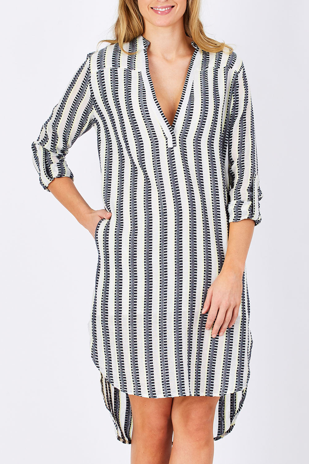 Model Maddy wearing size S of the Andros Dress in colour Stripe (White), from the front, cropped image