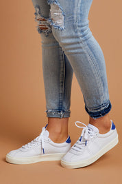 A model wearing size 38 of the 2843 Club S Comfort Leather Sneaker in colour Whitebluer (White), from the front, showing the whole outfit