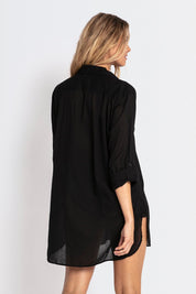 A model wearing the Basix Classic Painters Shirt in colour Black (Black), from the back