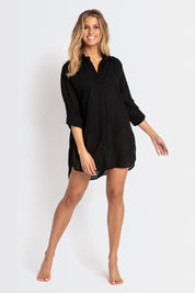 A model wearing the Basix Classic Painters Shirt in colour Black (Black), from the front, showing the whole outfit