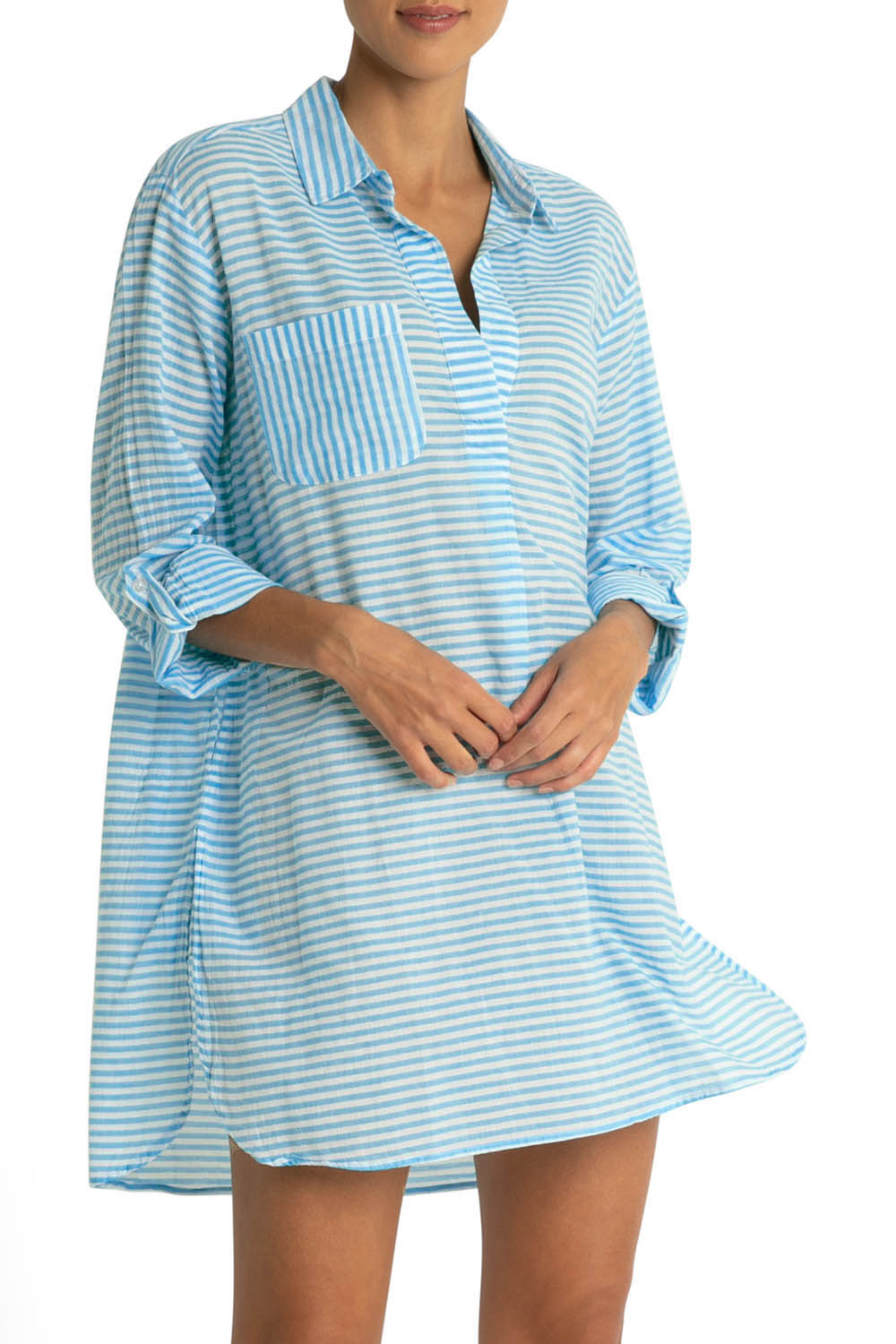 A model wearing the Summer Stripe Painters Shirt in colour Teal (Green), from the front, cropped image