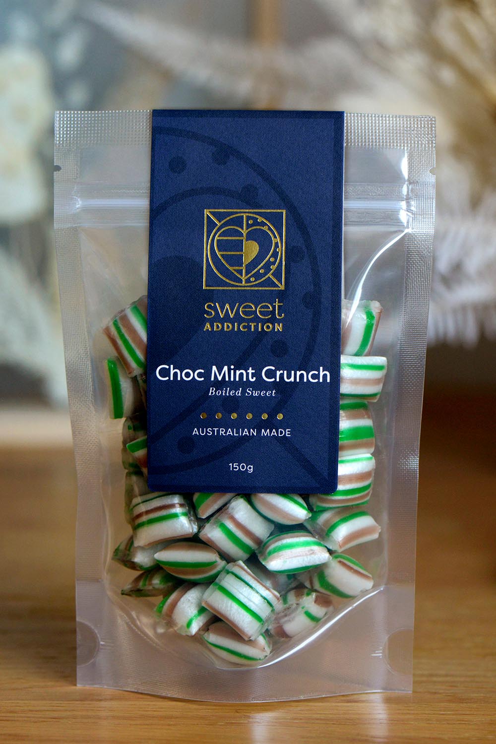 Product shot of the 150g Choc Mint Crunch Boiled Sweet - Chocmint in colour Chocmint, from the front