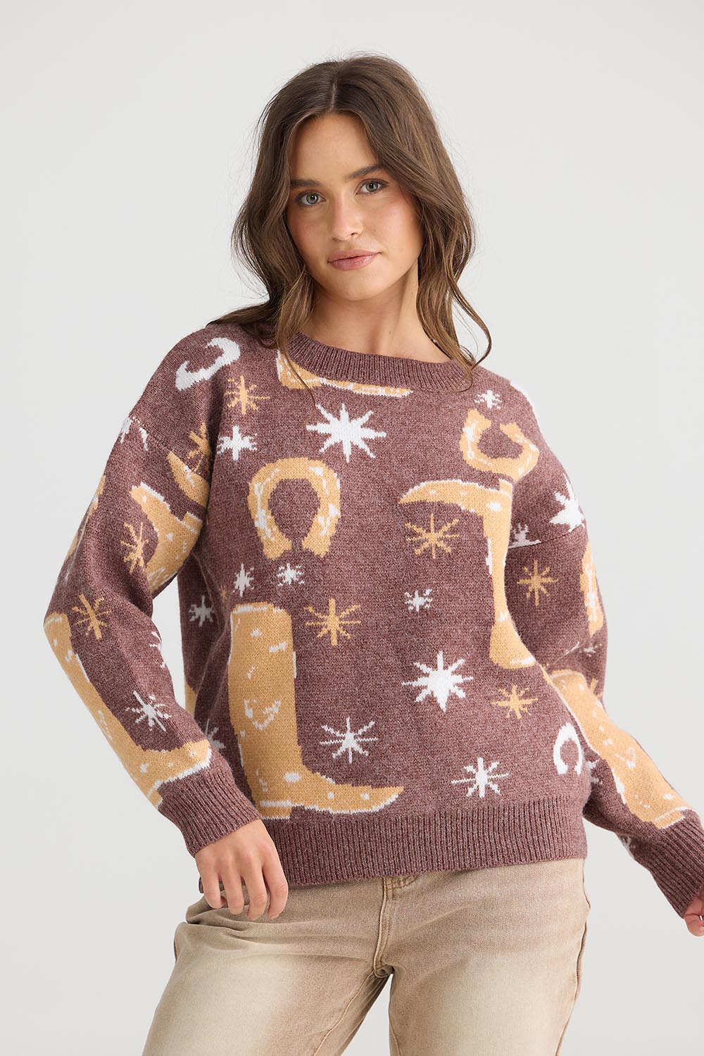 A model wearing the Lucky Boots Knit in colour Chocolate, from the front, cropped image
