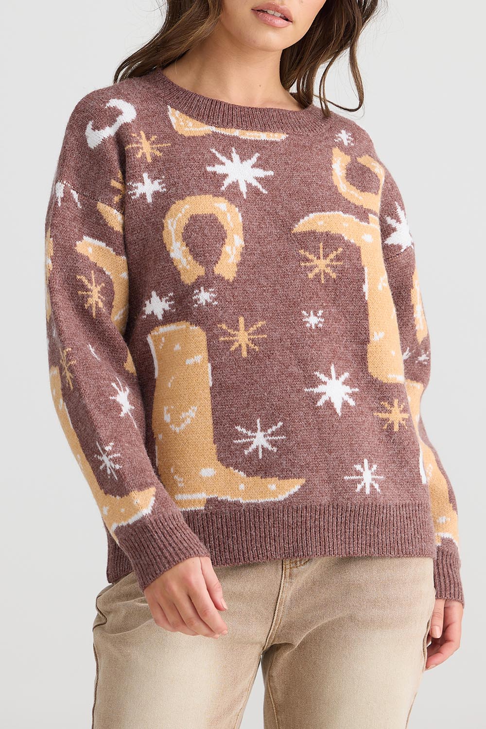A model wearing the Lucky Boots Knit in colour Chocolate, from the front, cropped image
