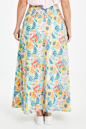 Model Laura wearing size 14 of the Rosie Maxi Skirt in colour Meadow (Blue), from the back