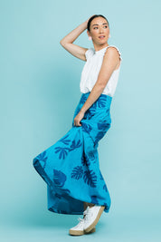 Model Katie wearing size 10 of the Rosie Maxi Skirt in colour Palm (Blue), from the front, showing the whole outfit