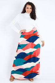 Model Sasha-Lee wearing size 16 of the Rosie Maxi Skirt in colour Horizon (Pink), from the front, showing the whole outfit