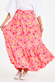 Model Courtney wearing size 10 of the Mallory Tier Skirt in colour Pinkdaisy (Pink), from the front, cropped image
