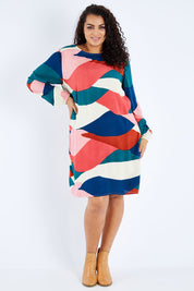 Model Sasha-Lee wearing size 16 of the Katy Shift Dress in colour Horizon (Pink), from the front, showing the whole outfit