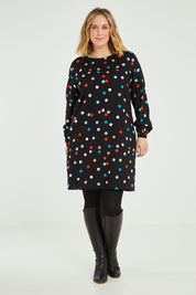 Model Jess wearing size 14 of the Katy Shift Dress in colour Dot (Black), from the front, showing the whole outfit