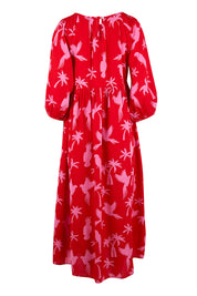 Product shot of the Alice Gathered Dress in colour Bird (Red), from the back
