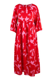 Product shot of the Alice Gathered Dress in colour Bird (Red), from the front