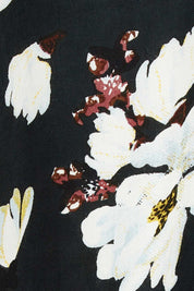 Product shot of the Alice Gathered Dress in colour Magnolia (Black), detail