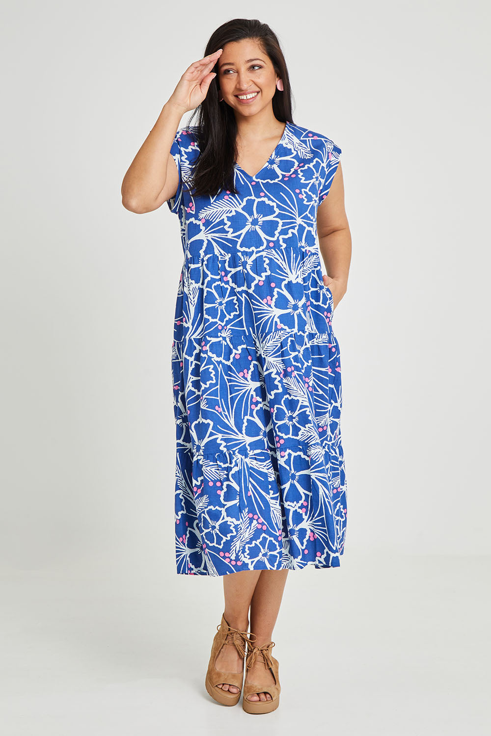 Model Terri-Leigh wearing size 14 of the Madison Tiered Dress in colour Bloom (Blue), from the front, showing the whole outfit